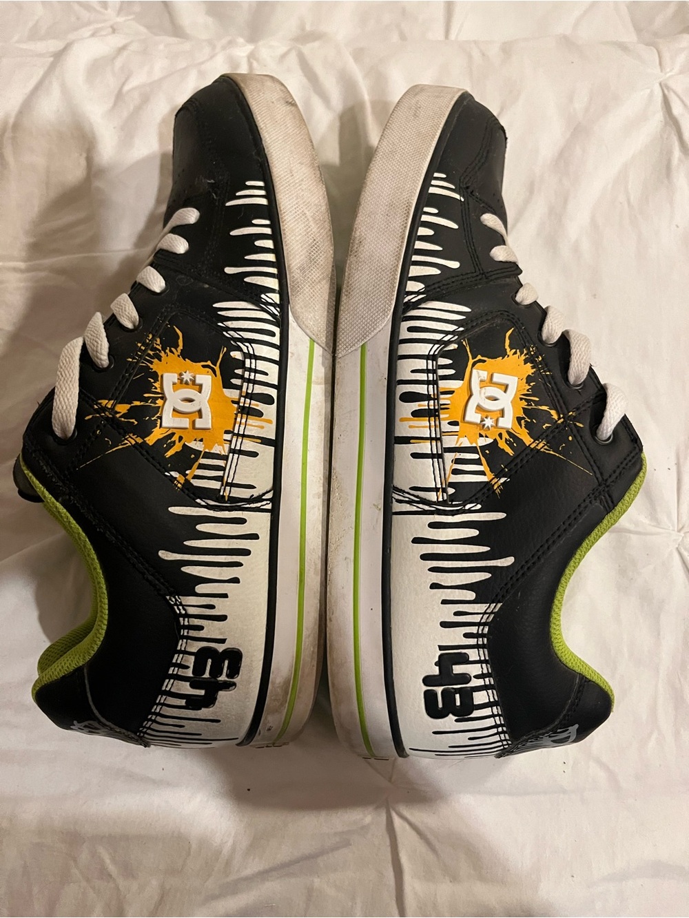 DC Black and White Skate Sneakers with Yellow Accent